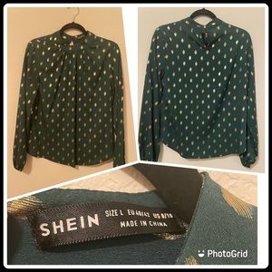 It’s a SHEIN blouse brand new. It’s a Green blouse with gold polka dots.